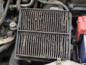 Dusty car air filter, causing potential engine running rough